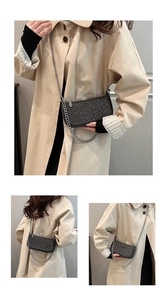 Detail of black rhinestone underarm bag with silver chain worn on a stylish trench coat