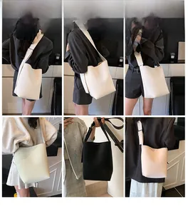 Collage großer minimalistischer Beuteltaschen in den Farben Weiß, Schwarz und Beige