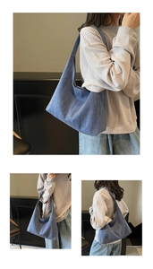 Detailansicht der blauen Denim-Textur und des breiten Schultergurts der Hobo-Tasche