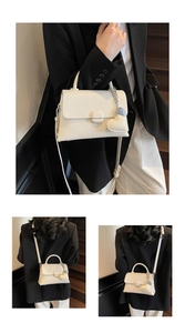 White lychee pattern leather handbag with metal chain heart pendant and crossbody strap