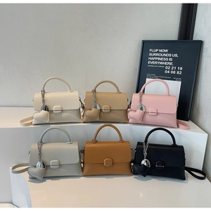 Detailed collection of litchi grain leather handbags with elegant heart charms in six colors