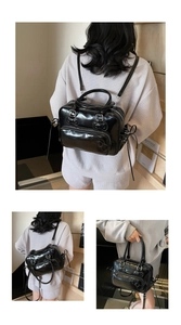Versatile black patent leather bag showing hand-carry, shoulder, and backpack styles