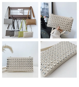 Close-up of punk style envelope bag with dense silver metal studs in six colors
