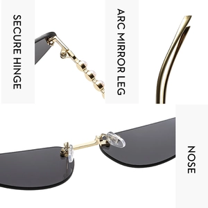 Detail view of cat eye sunglasses with secure hinges, arc legs and comfortable nose pads
