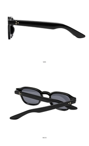 Side and back view of black sunglasses featuring three gold dot rivets on the temples