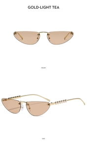Detail of rimless cat-eye sunglasses with gold metal temples and pearl embellishments