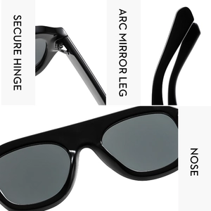 Detail view of large frame sunglasses showing sturdy hinges and ergonomic arc mirror legs