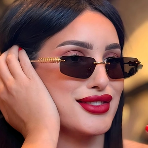Chic rimless rectangular sunglasses with gold spiral textured metal temples for outdoor wear