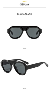 Front and side views of oversized black aviator sunglasses with polished frames