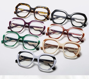 Flat lay view of geometric oversized eyewear frames in seven assorted stylish colors