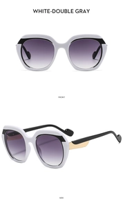 Front and side views of stylish oversized geometric sunglasses with white frames and grey lenses