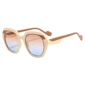 Fashionable oversized gradient sunglasses with chic cream and brown patchwork frames