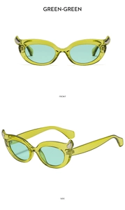 Detailed views of green cat-eye sunglasses with rhinestone horns and jelly frame