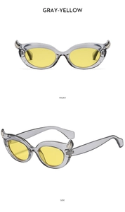 Front and side view of trendy gray-yellow cat eye sunglasses with devil horn frame design