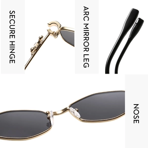 Detail view of gold metal sunglasses with secure hinge and adjustable nose pads