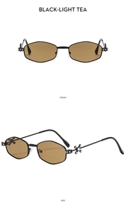 Detail of polygonal black metal sunglasses with light tea lenses and ornate hinges
