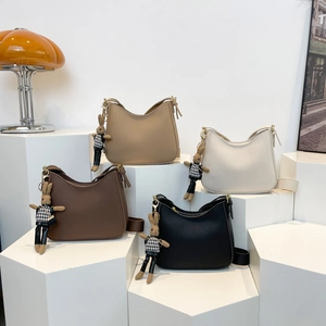 Fashionable lychee texture hobo bucket bag with cute rabbit pendant in four colors