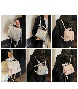 Multi-angle view of mini backpacks in silver and pink with bow details and buckles