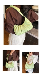 Détail du sac nuage plissé vert clair avec un nœud élégant sur la bandoulière réglable