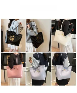 Multiple colors of minimalist glossy leather shoulder bags shown on models for daily use