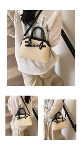 Détails du sac tressé en forme de coquille avec bordure cuir et boucle en métal argenté