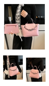 Pink glossy shoulder bag set with metal bow chain and matching rectangular pouch bag