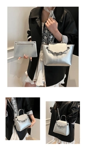 Macro detail of silver handbag set featuring metallic bow chain and matching pouch