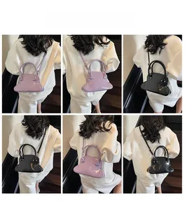 Detail shots of purple and black glossy shell bags shown from multiple angles and positions