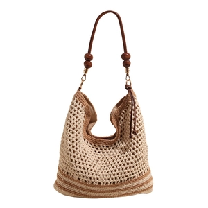 Beige woven hollow shoulder bag with brown stripes and wooden beads for beach commuting
