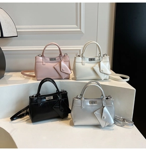 Detail of four colorful vintage handbags with silver twist locks and matching coin purses