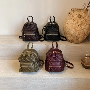 Chic quilted mini backpacks in dark brown, black, olive green, and burgundy faux leather