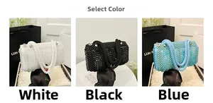 Close-up of sequined mini pillow bags in white, black and blue with woven pearl handles