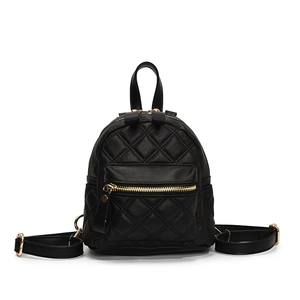 Quilted black mini backpack for women with golden hardware and adjustable straps