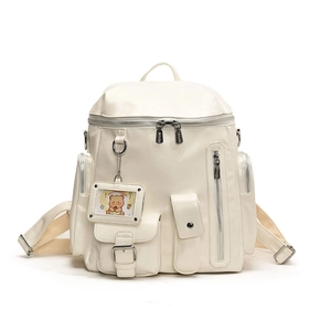 Chic cream white faux leather backpack with multi-pocket design and cute bear charm