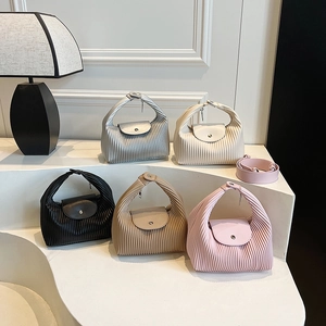 Pleated texture crossbody bag in five colors featuring a stylish half-moon structure
