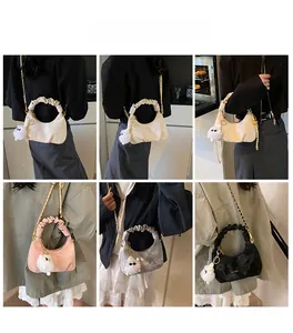 Multiple views of fashion pleated dumpling bag with chain strap and plush charm detail
