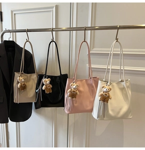 Minimalist large shoulder tote bags in four colors with cute plush bear charms on hooks