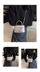 Detailed macro view of silver quilted leather box bag with camellia flower hardware