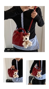 Red bucket bag for women 2025 spring casual shoulder crossbody handbag with cute bear charm.