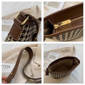 Detailed views of houndstooth shoulder bag with brown leather trim and gold hardware