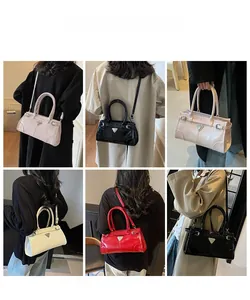 Collage of diverse colorful women's top handle bags featuring metal triangle logos
