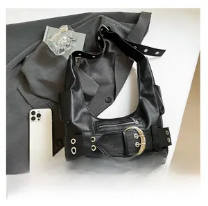 Close-up of black retro Hobo bag featuring silver buckle detail and textured leather finish
