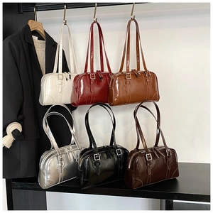 Detailed display of vintage soft leather tote bags in six stylish colors with silver buckles