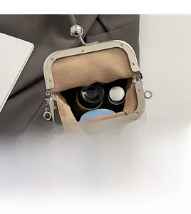 Macro view of silver metallic bag interior showing spacious capacity and premium lining