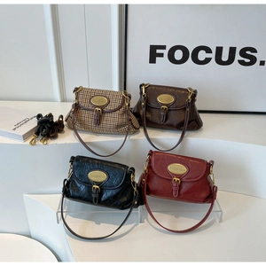 Collection of vintage crossbody bags in houndstooth, brown, black and red faux leather
