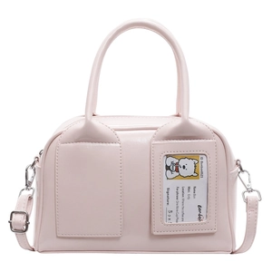 Light pink shiny patent leather Boston bag with top handles and adjustable shoulder strap