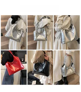 Chic oil wax leather tote bag with bow detail shown on a model in multiple angles
