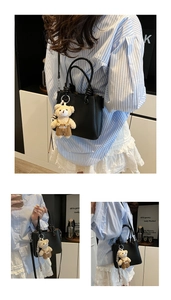 Black lychee leather bucket bag with bear charm shown in various crossbody carry styles