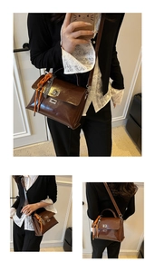 Detail of dark brown leather satchel with silver buckle and orange woven charm
