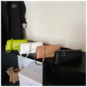 Detailed arrangement of four elegant minimalist PU leather shoulder bags in assorted colors